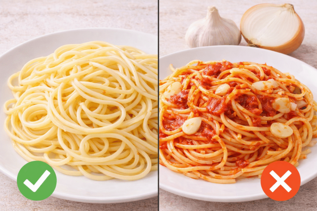 Plain pasta on one plate and pasta with garlic and onion on another plate marked as unsafe